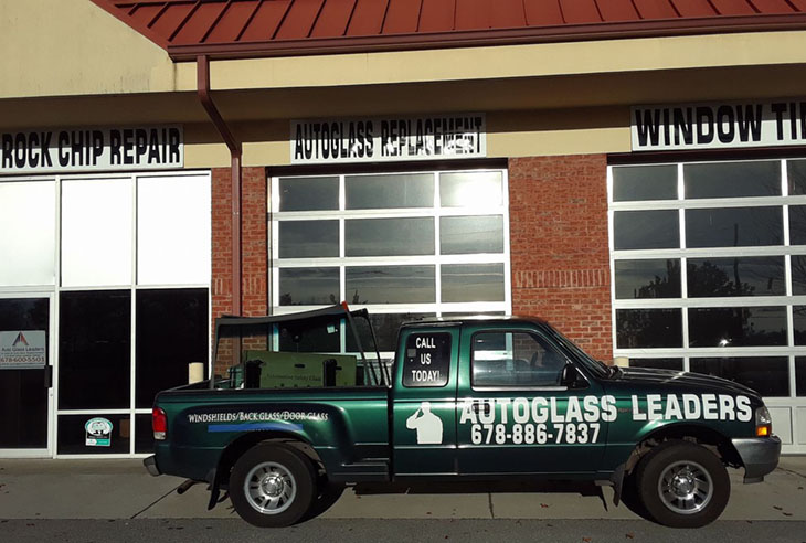2Auto Glass Leaders Truck in front of shop