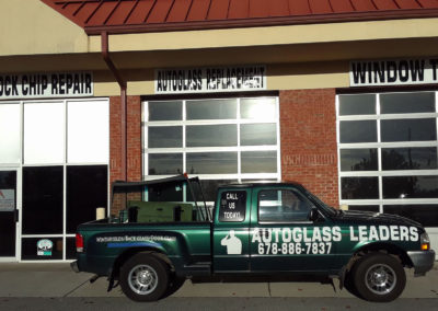Auto Glass Leaders Truck in front of shop